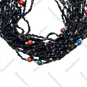 Vintage Multi stranded black beaded necklace with color accents in euc